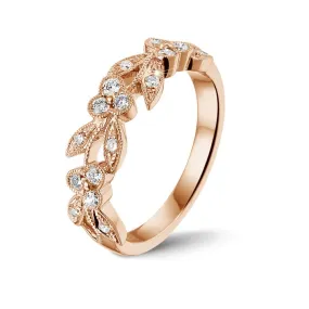0.32 quilates alianza floral en oro rosa con pequeños diamantes redondos 