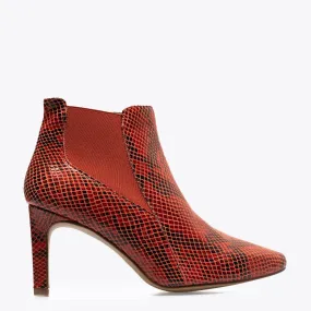 SAUVAGE Botín animal print tacón ROJO