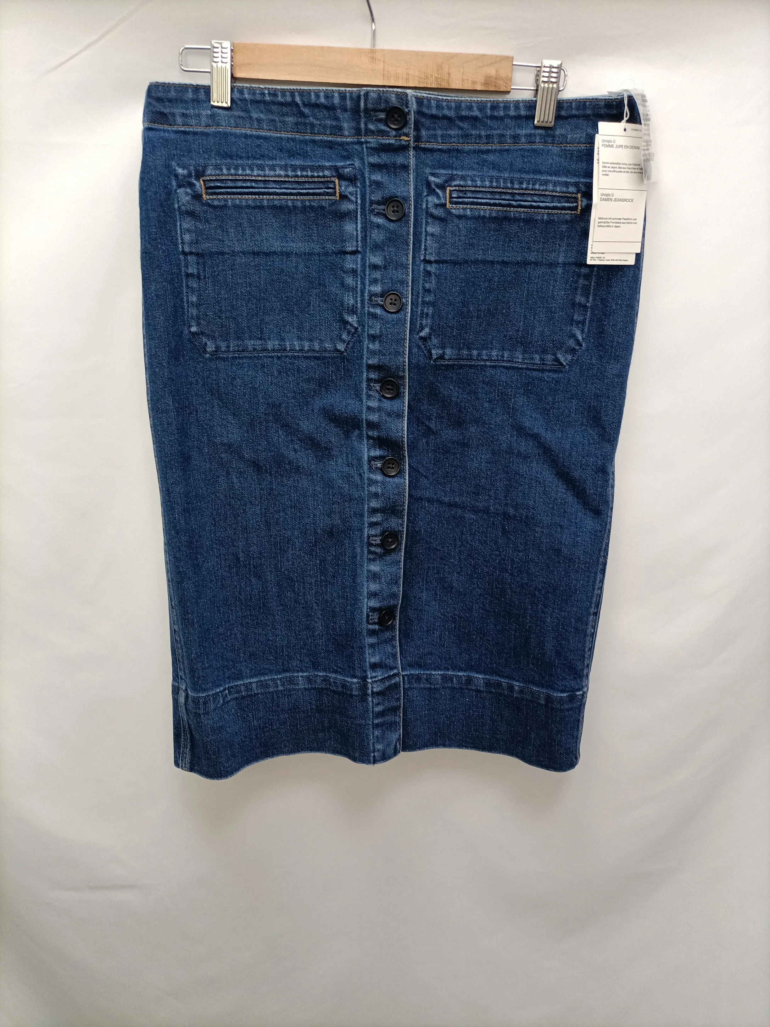 UNIQLO. Falda denim botones T.44